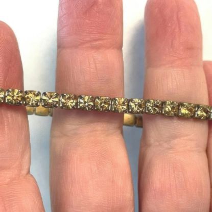 Picture of Topaz Rhinestone Crystal Tennis Bracelet Gold Tone